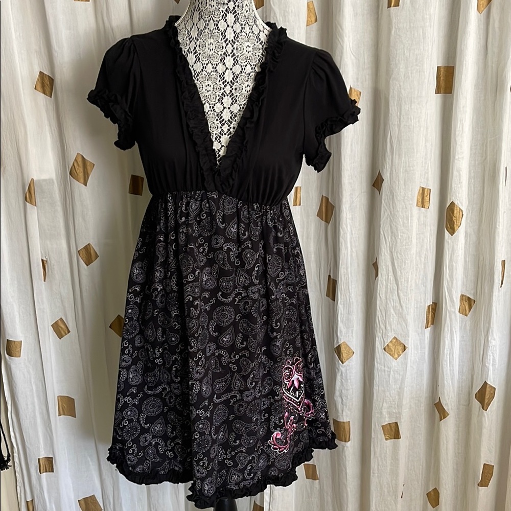 Elegant Black Dress with Paisley and Pink Details